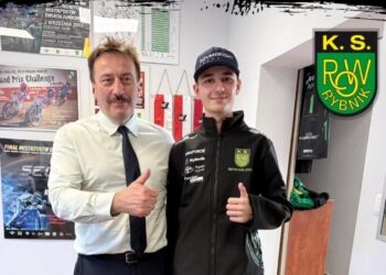 Two Men Stand Side by Side Giving Thumbs Up in a Club Room One in a Dress Shirt and Tie the Other in a Black Sports Jacket with a Ks Row Rybnik Crest with Posters on the Wall and the Club Logo Visible 11 Maja 2019 