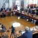 City Council Meeting with Officials Seated Around a U shaped Table Laptops and Microphones in Use a Camera Recording the Session in Progress 15 Czerwca 2020