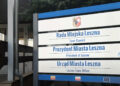 Sign for Rada Miejska Leszna town Council and Prezydent Miasta Leszna president of Leszno with a Crest on a Blue framed Outdoor Sign 16 Czerwca 2020