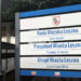 Sign for Rada Miejska Leszna town Council and Prezydent Miasta Leszna president of Leszno with a Crest on a Blue framed Outdoor Sign 15 Czerwca 2020